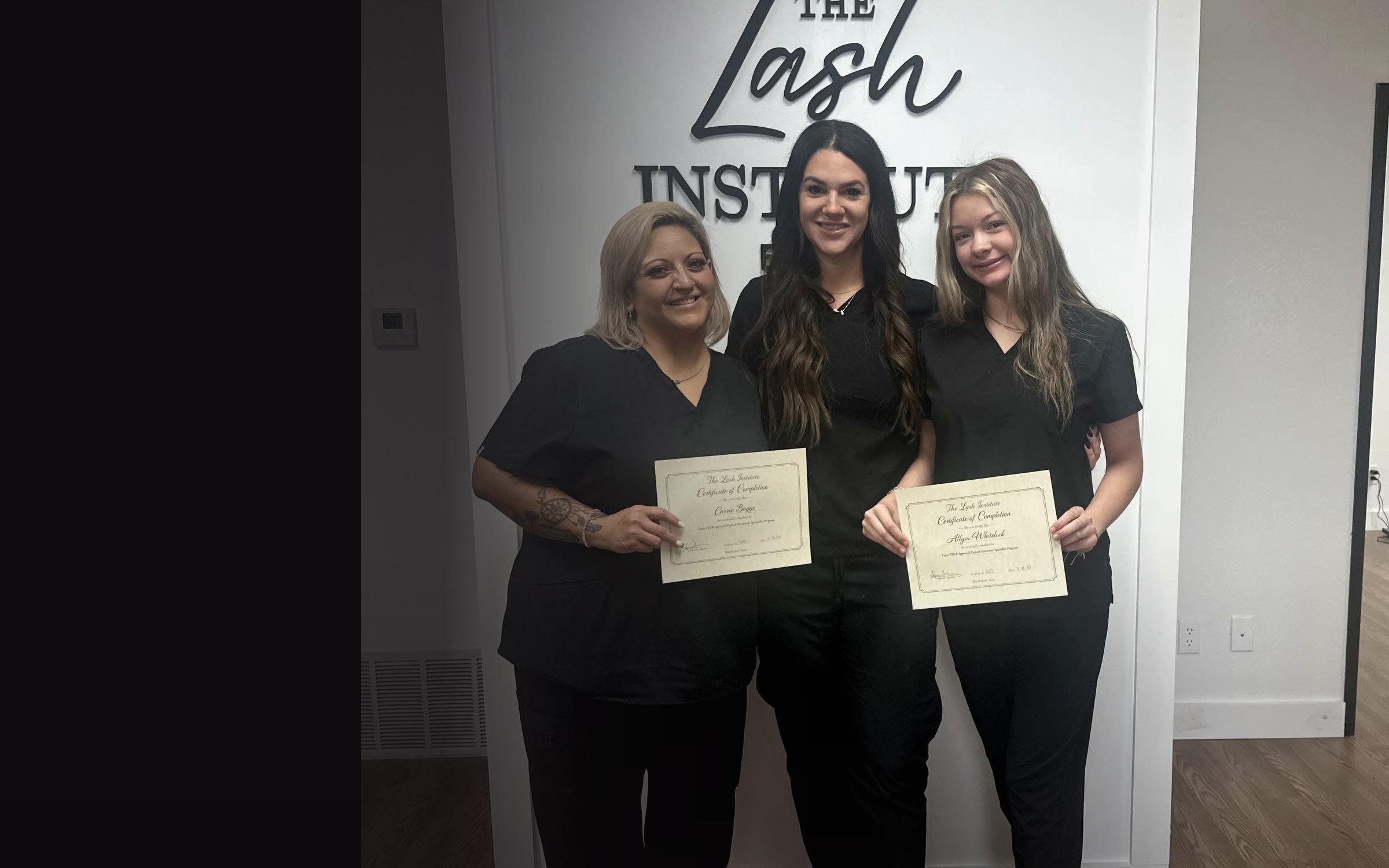 Graduates of The Lash Institute with certificates of completion